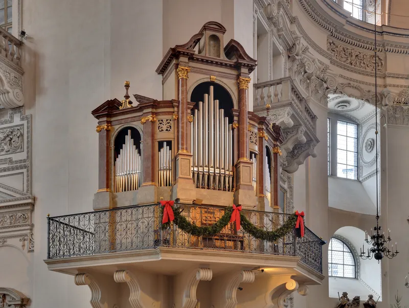 A Baroque organ loft high in the nave of Salzburg Cathedral